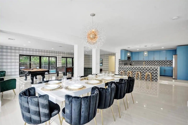 dining area with an inviting chandelier and billiards