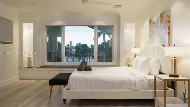 bedroom featuring hardwood / wood-style floors