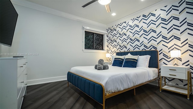 bedroom with crown molding, ceiling fan, and dark hardwood / wood-style flooring