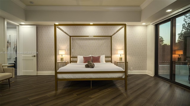 bedroom featuring crown molding, dark hardwood / wood-style floors, and access to exterior