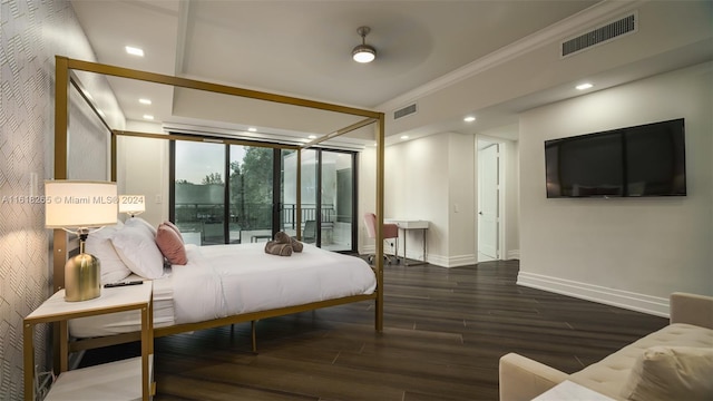 bedroom featuring dark hardwood / wood-style floors, access to exterior, and crown molding