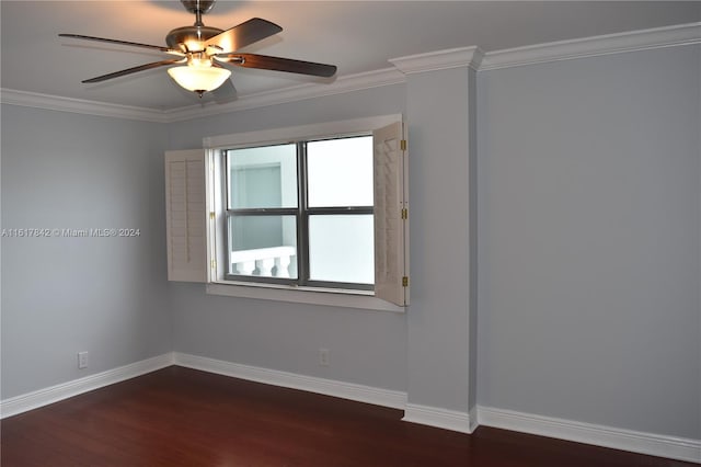 unfurnished room featuring ceiling fan, dark wood-type flooring, and ornamental molding