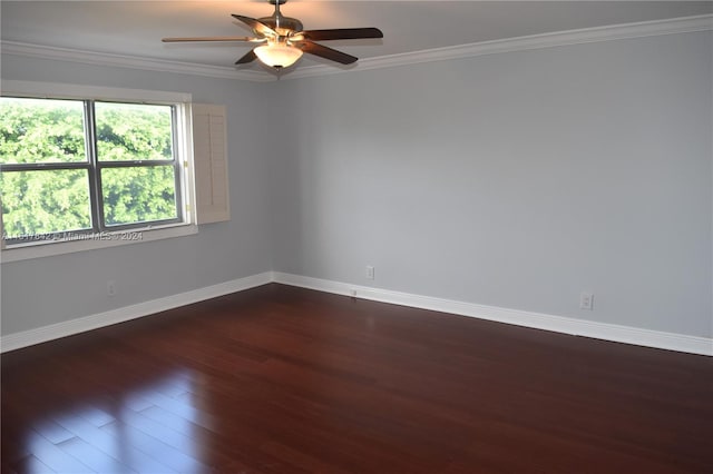 unfurnished room featuring dark hardwood / wood-style flooring, ceiling fan, and ornamental molding