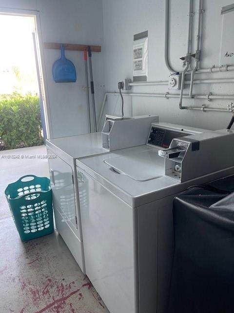 laundry room with separate washer and dryer