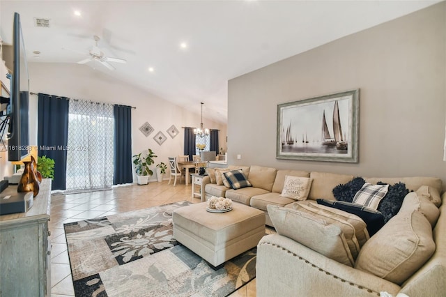 tiled living room with ceiling fan with notable chandelier and lofted ceiling