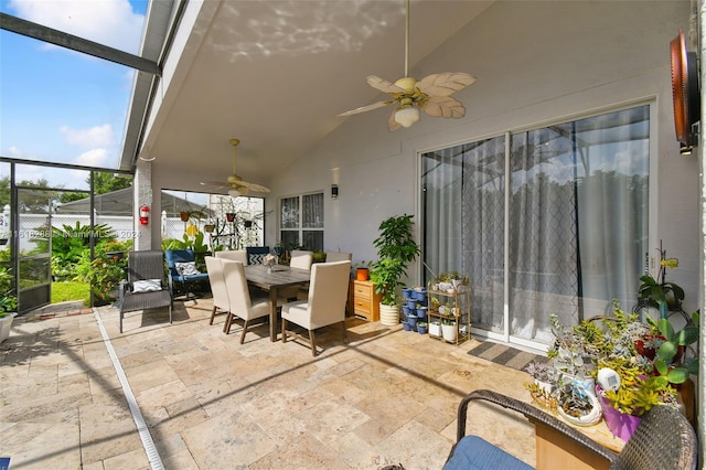 view of patio / terrace featuring ceiling fan and a lanai