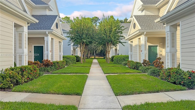 200 Southern Pecan Cir Unit 105, Winter Garden, FL 34787 - view of community featuring a lawn and a residential view