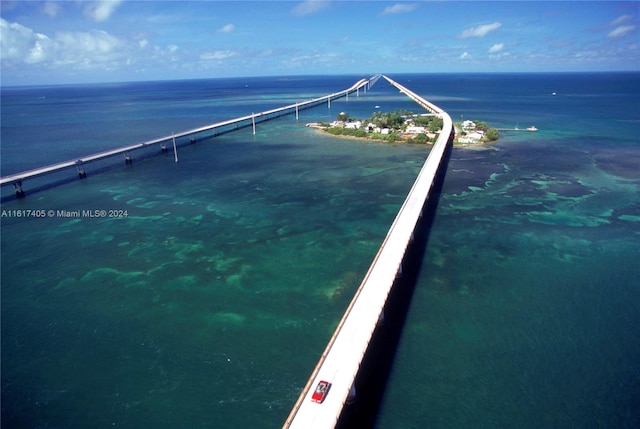 drone / aerial view with a water view