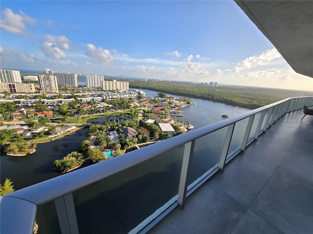 balcony featuring a water view