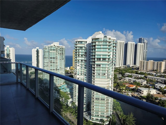 balcony featuring a water view