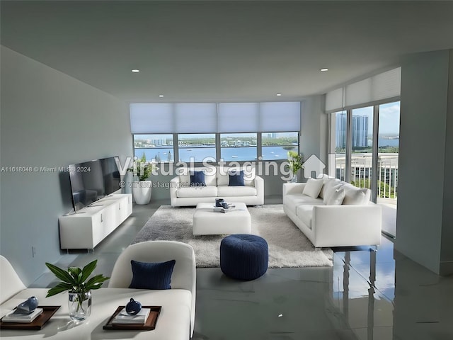 living room with a wall of windows and a water view