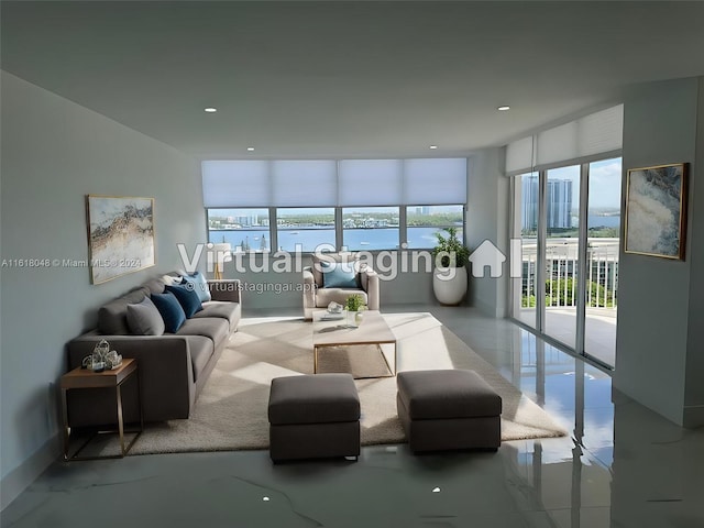 living room with a water view and expansive windows