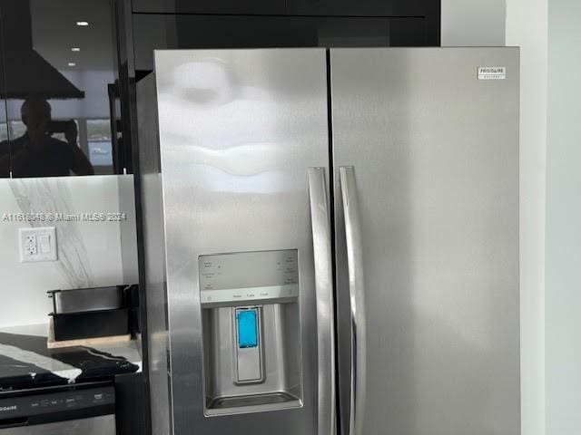 interior details with stainless steel fridge with ice dispenser and dishwasher