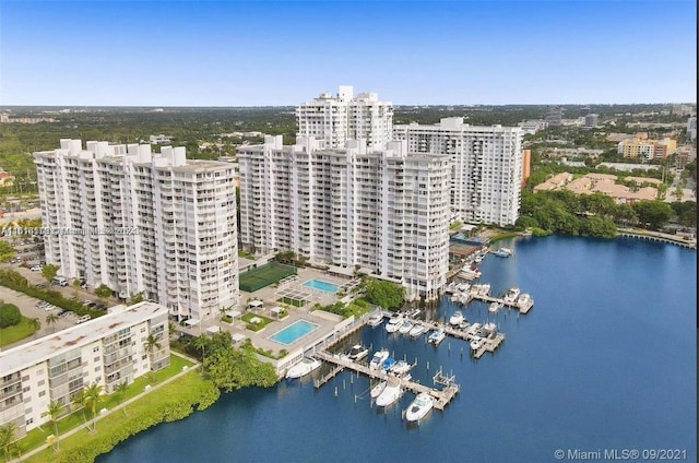 birds eye view of property featuring a water view