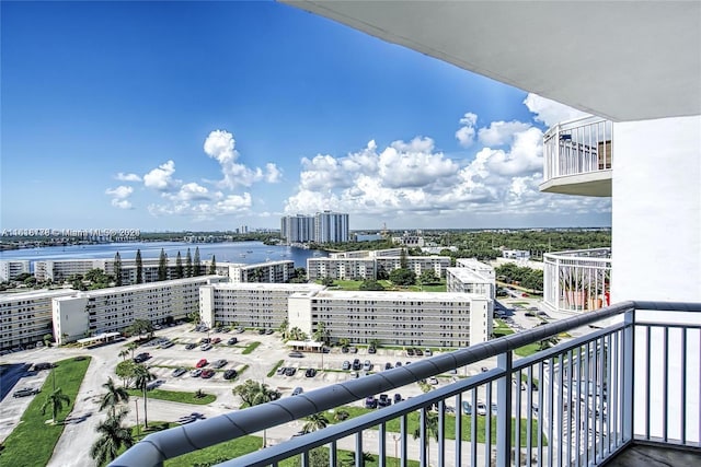 balcony featuring a water view