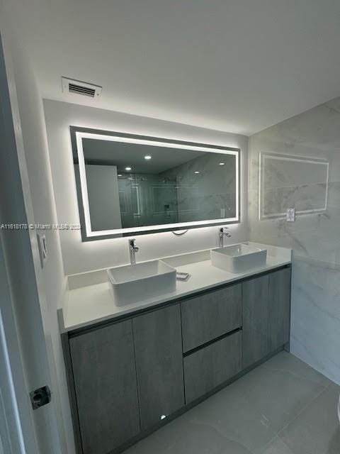 bathroom with double vanity