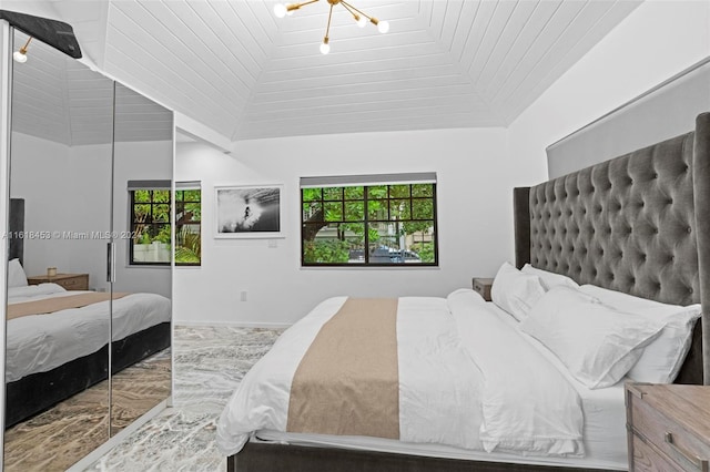 bedroom with a notable chandelier, wood ceiling, multiple windows, and vaulted ceiling