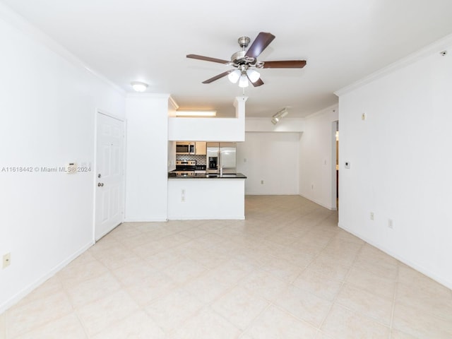 interior space with crown molding, light tile patterned floors, and ceiling fan