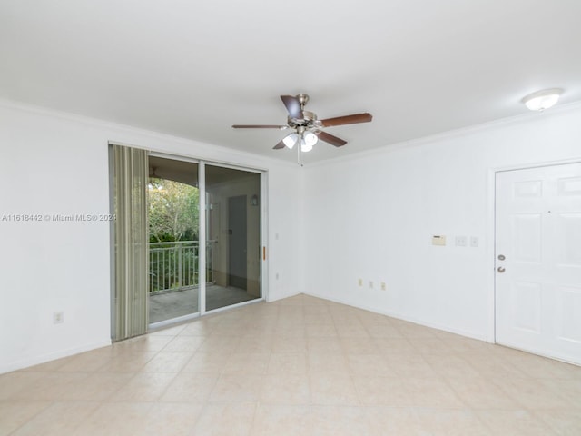 unfurnished room featuring ornamental molding, light tile patterned flooring, and ceiling fan