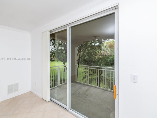 doorway to outside featuring ceiling fan and light tile patterned floors