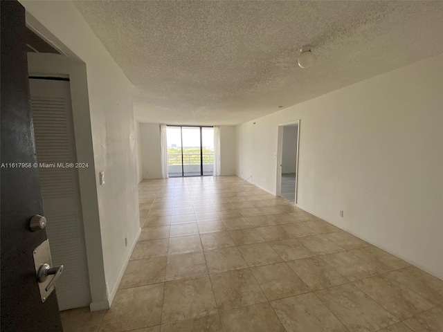 interior space with a textured ceiling