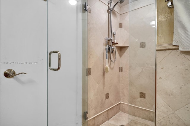 bathroom featuring an enclosed shower