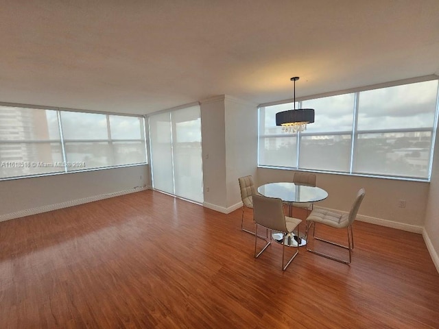 unfurnished dining area featuring hardwood / wood-style flooring