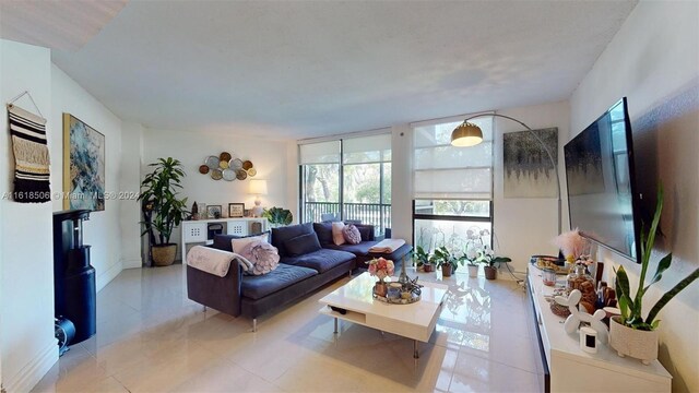 living room with light tile patterned floors