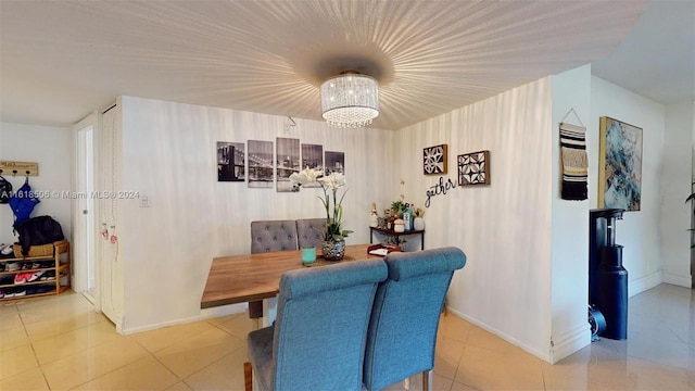 dining area with light tile patterned flooring