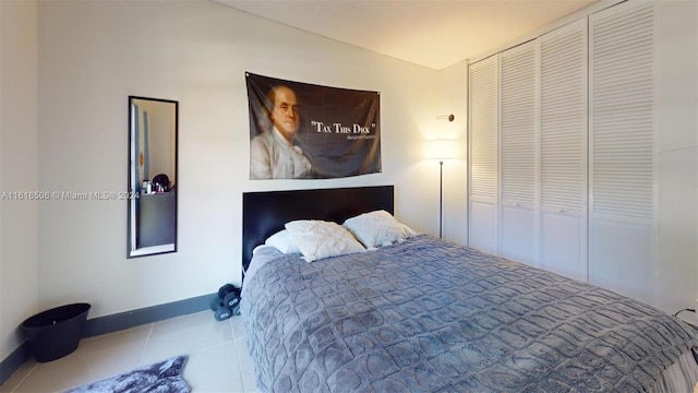 bedroom featuring light tile patterned flooring