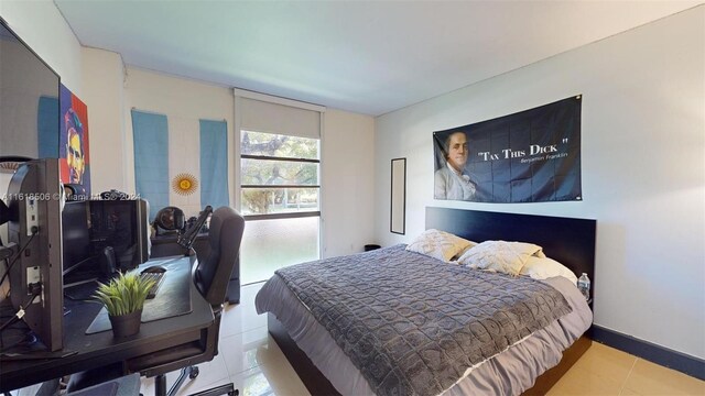 bedroom featuring tile patterned flooring