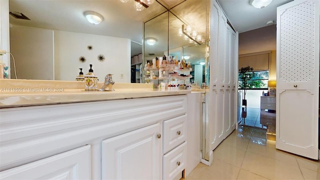 bathroom with vanity and tile patterned floors