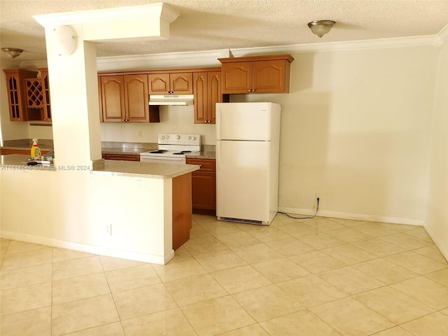 kitchen featuring crown molding, white appliances, light tile patterned floors, kitchen peninsula, and a textured ceiling