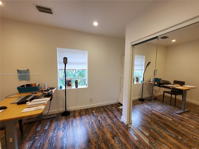 office space featuring dark hardwood / wood-style flooring