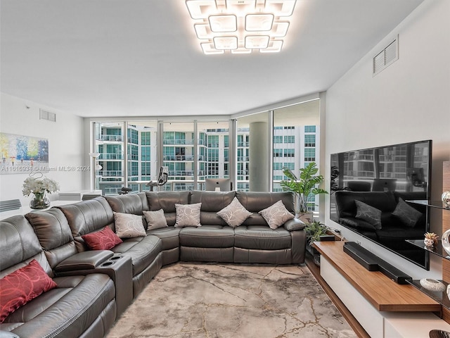 living room featuring plenty of natural light and expansive windows