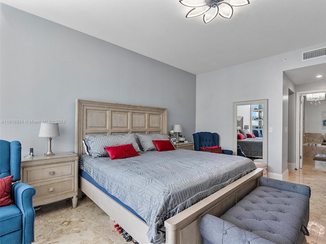 bedroom featuring connected bathroom and light tile patterned floors