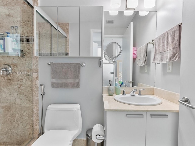 bathroom with walk in shower, toilet, and vanity