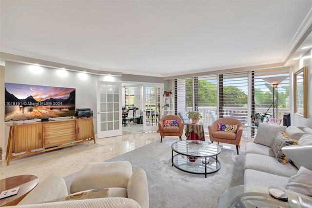 living room with crown molding and french doors