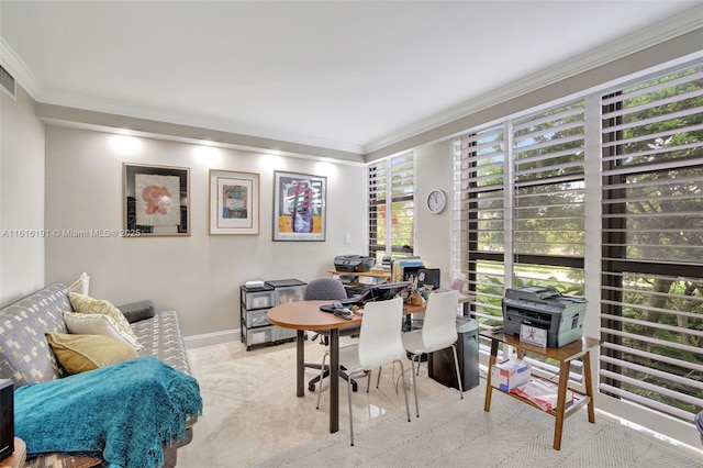 home office with baseboards, visible vents, and crown molding