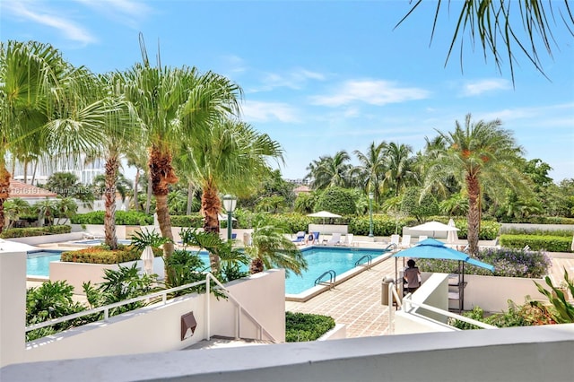 pool with a patio area