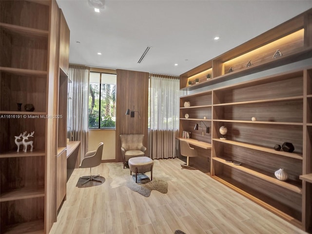 living area with wood finished floors