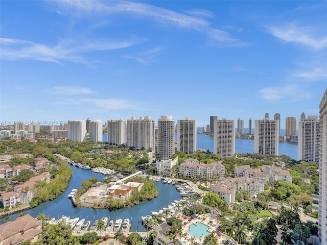 aerial view featuring a water view and a city view