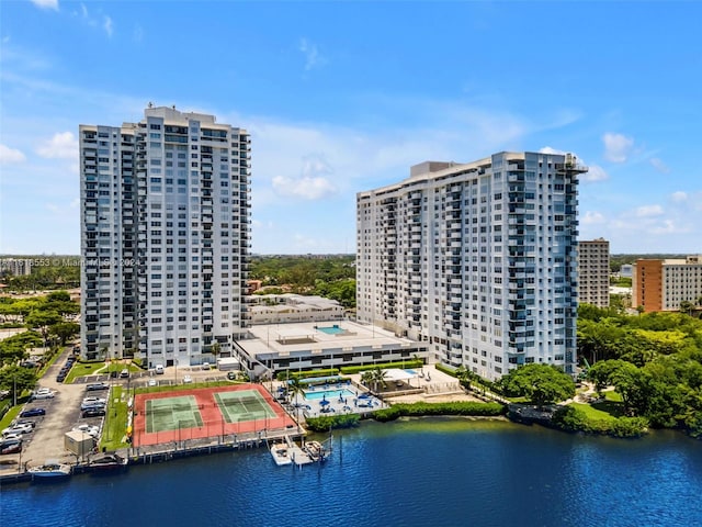 birds eye view of property featuring a water view