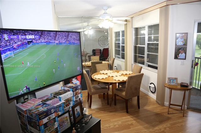 dining room featuring ceiling fan and wood-type flooring