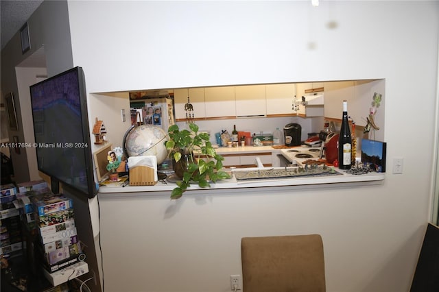 kitchen featuring white fridge and stove