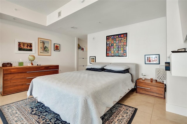 bedroom with light tile patterned flooring