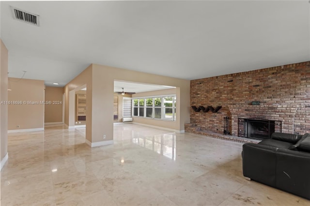 1154 Jefferson St, Hollywood, FL 33019 - living room featuring baseboards, a brick fireplace, visible vents, and marble finish floor