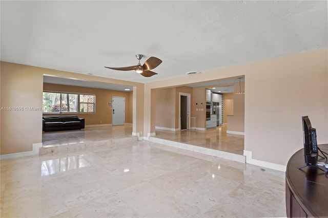 unfurnished room featuring ceiling fan