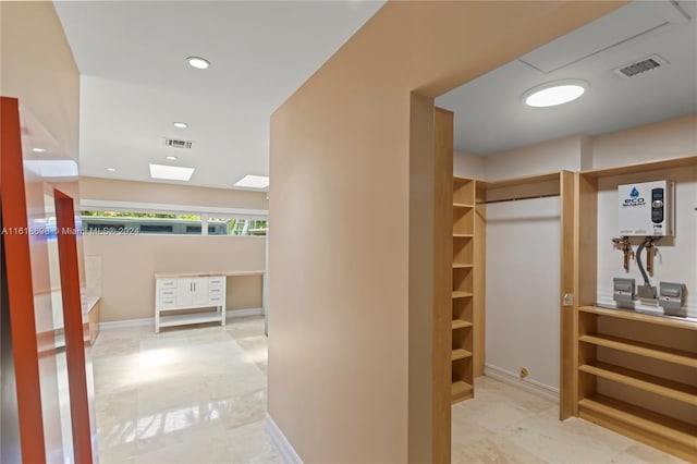 1154 Jefferson St, Hollywood, FL 33019 - spacious closet featuring tile patterned floors and visible vents