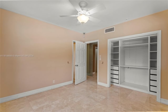 unfurnished bedroom with a closet and ceiling fan